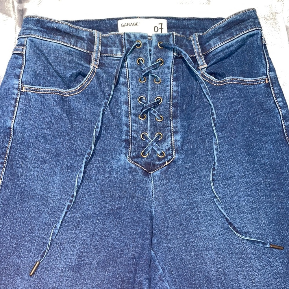 Lace up high rise skinny jeans